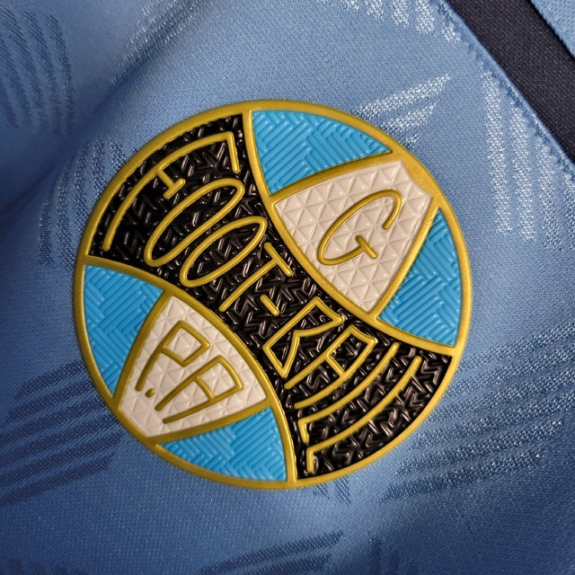Camisa Retrô Grêmio Edição Especial 20/21 - Masculina Umbro - Azul com detalhes em dourado e branco