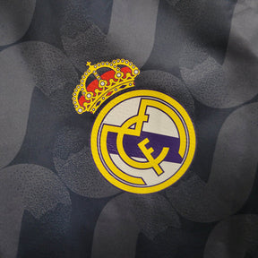 Jaqueta Corta-Vento Real Madrid II 23/24 - Masculina Adidas - Azul com listras pretas