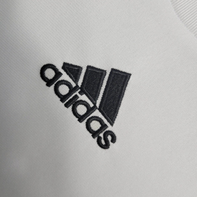 Camisa Retrô Real Madrid I 09/10 manga longa - Masculina Adidas - Branca com detalhes em preto e amarelo