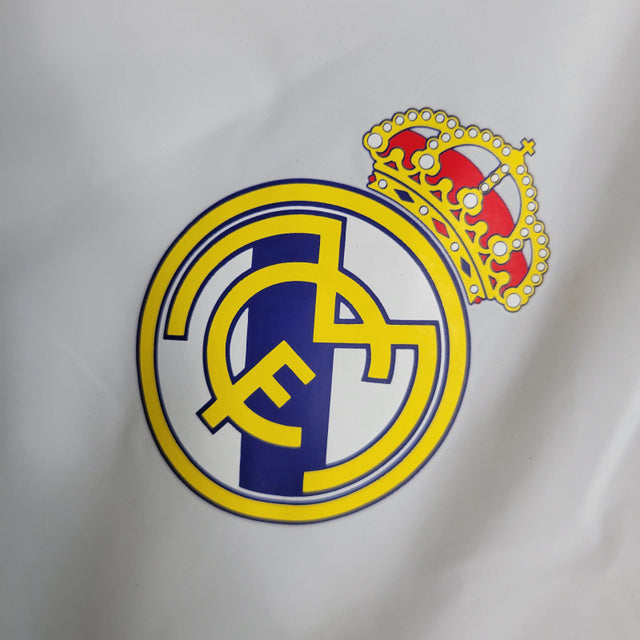 Jaqueta Corta-Vento Real Madrid 2023 - Masculina Adidas - Branca com detalhes em azul