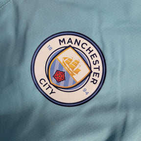 Jaqueta Corta-Vento Manchester City 23/24 - Masculina Puma - Azul com detalhes em branco
