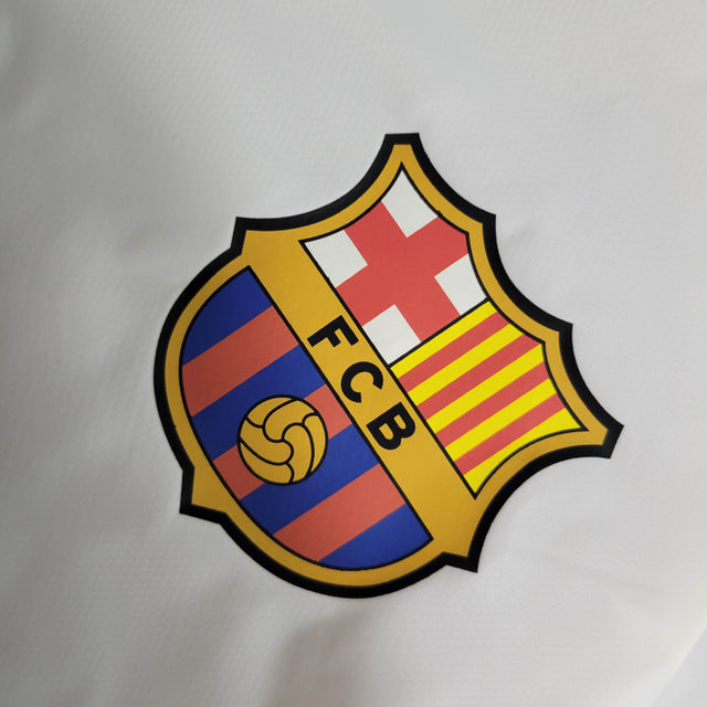 Jaqueta Corta-Vento Barcelona 23/24 - Branca com detalhes em vermelho e azul