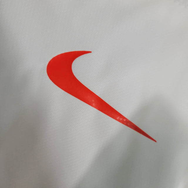 Jaqueta Corta-Vento Barcelona 23/24 - Branca com detalhes em vermelho e azul