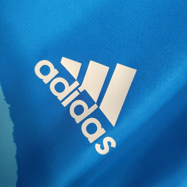 Jaqueta Corta-Vento Real Madrid 23/24 - Masculina Adidas - Azul