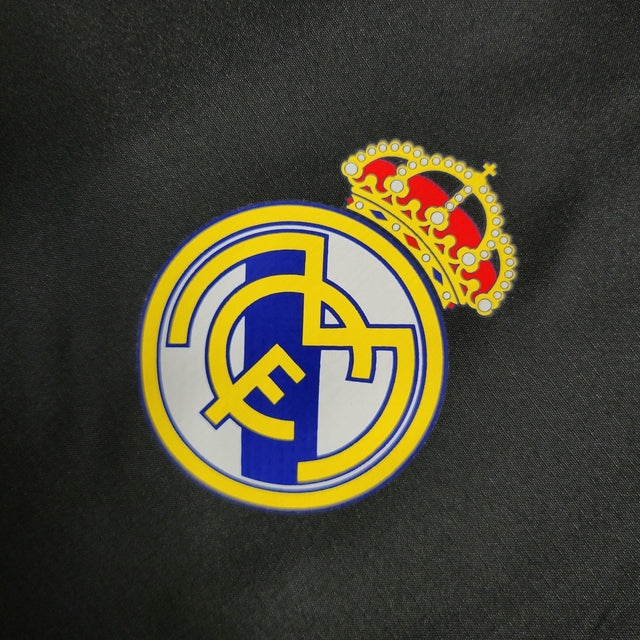 Jaqueta Corta-Vento Real Madrid 23/24 - Masculina Adidas - Preta