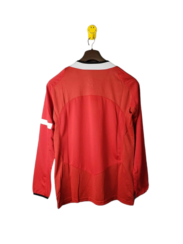 Camisa Retrô Manchester United I 2005 - Masculina Nike - Vermelha com detalhes em preto e branco