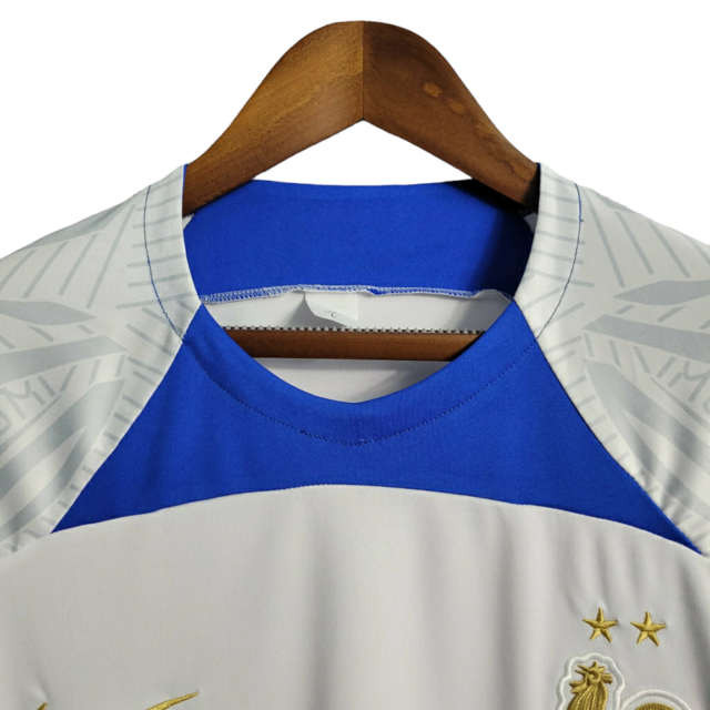 Camisa Seleção da França Treino 22/23 - Torcedor Nike Masculina - Branca com detalhes em azul e dourado