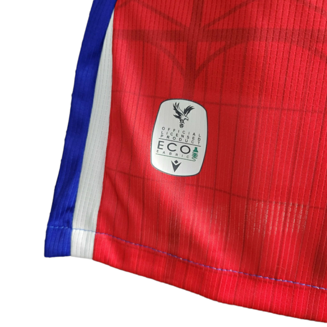 Camisa Crystal Palace I 23/24 - Jogador Macron Masculina - Vermelha e azul com detalhes em branco