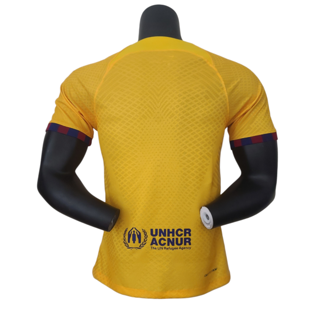 Camisa Barcelona II 22/23- Jogador Nike Masculina - Amarela com detalhes em vermelho