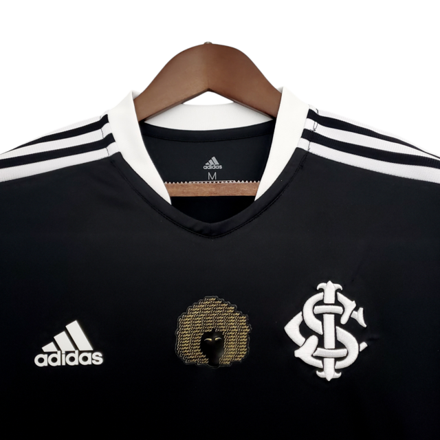 Camisa Internacional Edição Especial Consciência Negra 21/22 - Torcedor Adidas Feminina - Preta com detalhes em branco