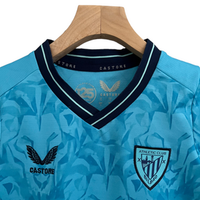 Kit Infantil Atlético de Bilbao II Castore 23/24 - Azul com detalhes em preto e branco