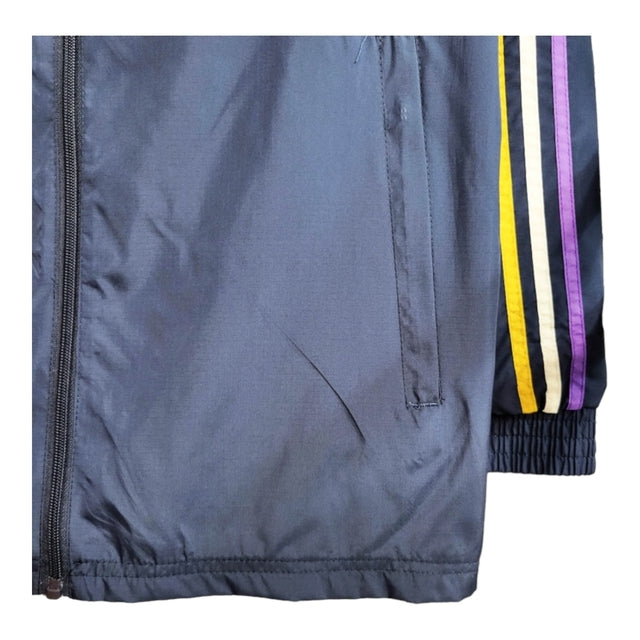 Jaqueta Corta-Vento Real Madrid 23/24 - Masculina Adidas - Azul com detalhes em amarelo
