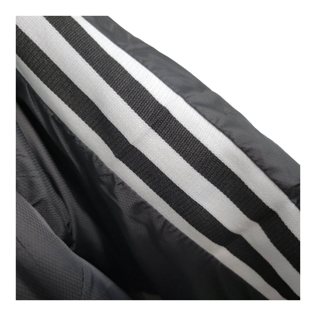 Jaqueta Corta-Vento Manchester United 23/24 - Masculina Adidas - Preta