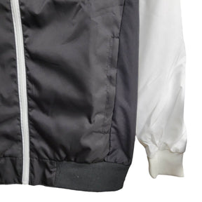 Jaqueta Corta-Vento Internacional 24/25 - Masculina Nike - Branca e preta