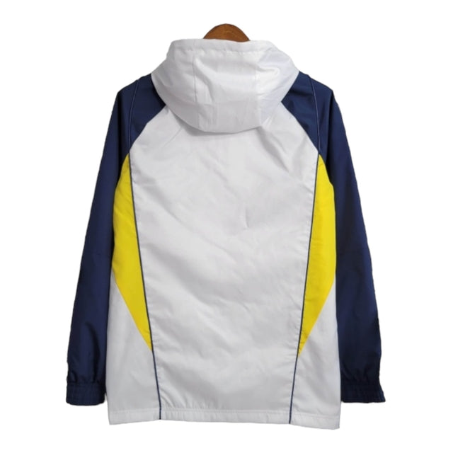 Jaqueta Corta-Vento Real Madrid 23/24 - Masculina Adidas - Branca com detalhes em azul e amarelo