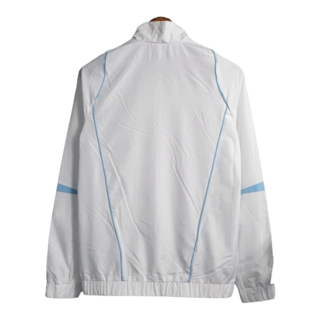 Jaqueta Corta-Vento Real Madrid 23/24 - Masculina Adidas - Branca com detalhes em azul