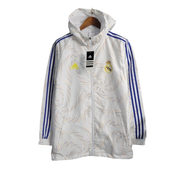 Jaqueta Corta-Vento Real Madrid 21/22 - Masculina Adidas - Branca com detalhes em azul e amarelo